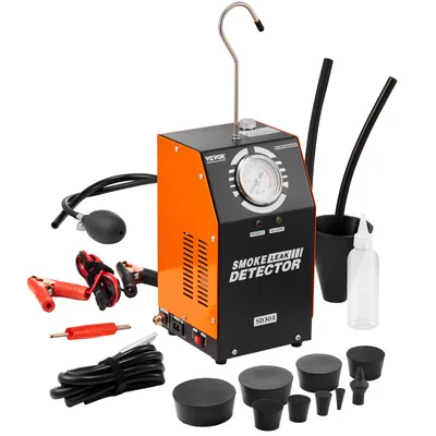 A smoke leak detector kit with various accessories laid out on a white background.