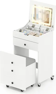 A white vanity set with a lighted mirror, storage drawers, and a stool, shown with the stool pulled out.