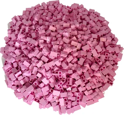 A pile of pink LEGO bricks.