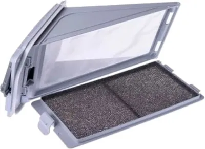 A gray filter for a tumble dryer is shown open, revealing a mesh screen and a dark foam filter.