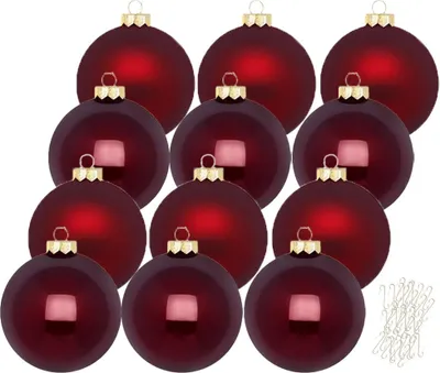 A collection of red Christmas ornaments with gold caps, arranged in a grid pattern on a white background.