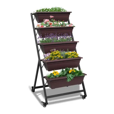 A multi-tiered planter with various flowers and plants.