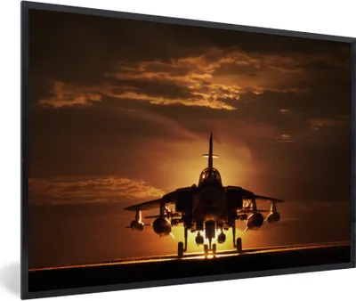 Produktbild von MuchoWow® Gerahmtes Poster Die Silhouette eines Düsenjägers während eines Sonnenuntergangs 30x20 cm - Poster mit Schwarzem Bilderrahmen Wandposter Rahmen Foto Bilder - Kunstdruck - Bild-Poster