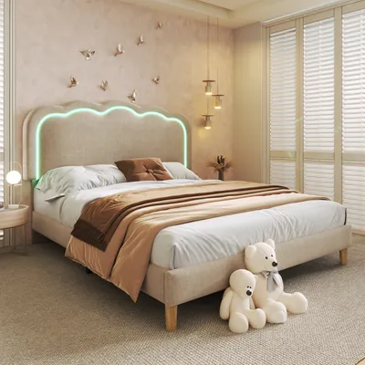 A bedroom scene with a bed, pillows, and teddy bears.