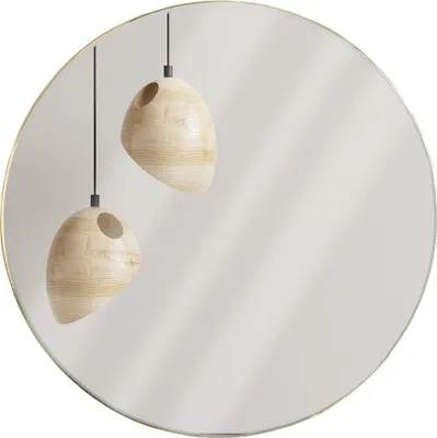 Two wooden pendant lights are reflected in a round mirror with a gold frame.