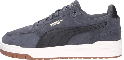 A side view of a gray Puma sneaker.