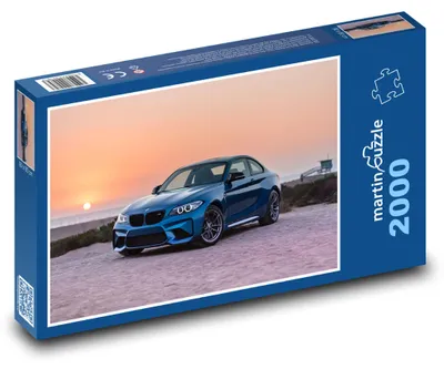 Obrázok produktu pre Puzzle 2000 Športové auto pri západe slnka - martinpuzzle
