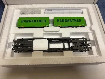 Produktbild von MÄRKLIN H0 Taschenwagen mit LKW Wechselaufbauten Hanggartner  47453-02