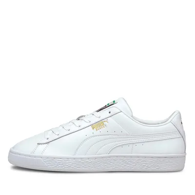 A white Puma Basket Classic XXI Uni Sneaker is shown from the side against a white background.