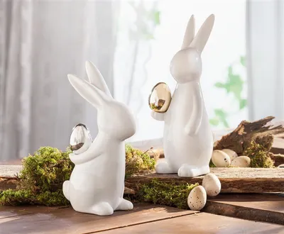 Produktbild von 2x Osterhase "Classical" aus Porzellan, weiß mit Osterei in gold & silber, Hasen 20 + 23 cm hoch, Dekofigur, Dekohase
