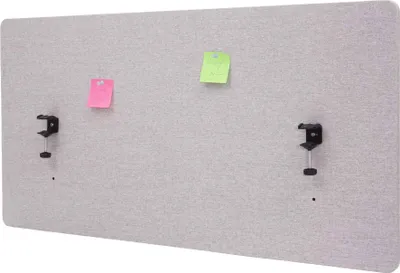 A light gray fabric partition with two clamp-on brackets and two sticky notes attached.