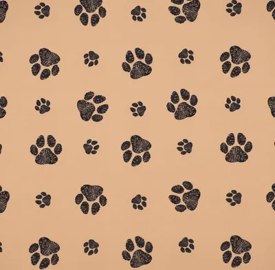 Produktbild von Outdoorstoff Meterware polsterfähig Pawprints beige schwarz 1,60m