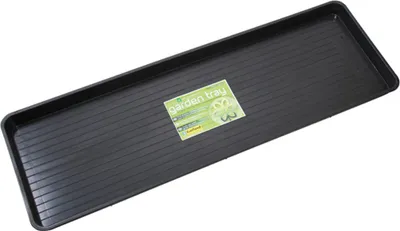 A black rectangular garden tray with a label on it, placed on a white background.