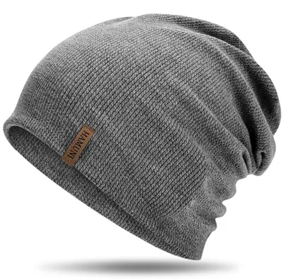 Immagine prodotto di Berretto Slouch in jersey, colore grigio scuro, elasticizzato, morbido e confortevole, adatto sia per uomo che per donna