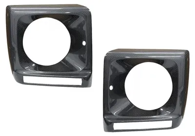 Imagen del producto de Cubiertas para faros delanteros de fibra de carbono, estilo G65, para Mercedes G W463, modelos de 1989 a 2018.