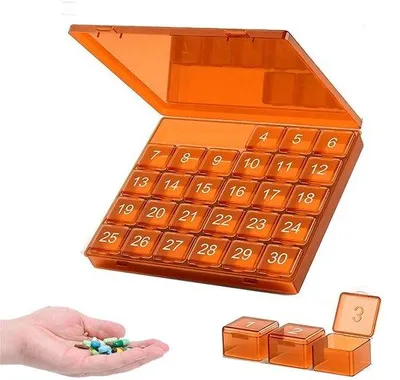 Imagen del producto de Caja para pastillas de 30 días - Dosificador mensual para pastillas - Con compartimentos extraíbles - Gran caja para pastillas, ideal para viajes, vitaminas y medicamentos - Color naranja