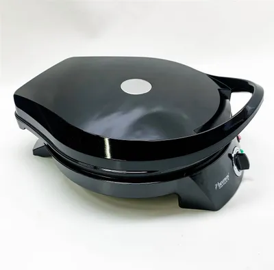 Image de Bestron four à pizza électrique, Pizza Maker jusqu'à 230°C, avec chaleur supérieure/inférieure, pour pizza faite maison ou surgelée, tarte flambée, quiche ou wraps jusqu'à Ø 27cm, 1.800 Watt, couleur : noir