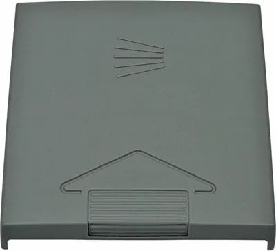 A gray plastic lid with embossed markings.