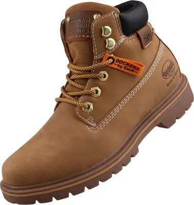 Das Bild zeigt einen gelben Stiefel der von der Seite betrachtet wird. Die Struktur und das Design des Stiefels sind klar erkennbar und verleihen ihm ein markantes Aussehen.