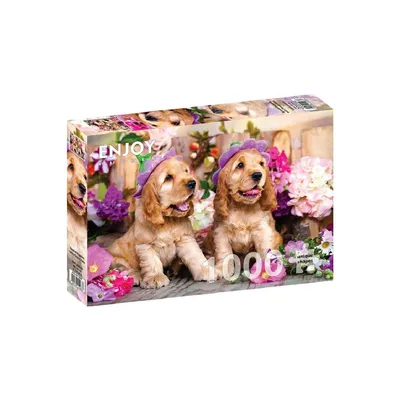 Image de Puzzle 1000 pièces Enjoy – Chiots épagneul avec chapeaux de fleurs