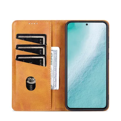 A brown leather flip case for a smartphone, open to reveal card slots and a phone screen.