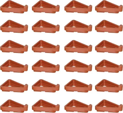 A grid of orange triangular plant pot feet on a white background.