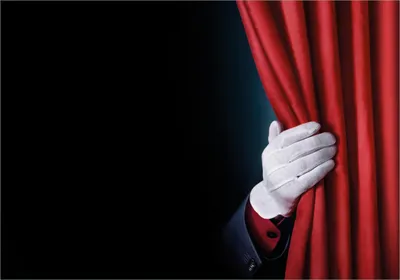 Produktbild von Wallario Poster - Vorhang auf für die Show  Hand hinterm roten Vorhang, Kunstdruck Größe: 70 x 100 cm