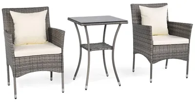 Immagine prodotto di Set da giardino in rattan composto da 3 pezzi, con tavolo in vetro e cuscini.