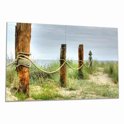 Produktbild von Wallario Herdabdeckplatte aus Glas, Größe 80 x 52 cm 2-teilig, Motiv Düne am Strand mit Holzpfahl