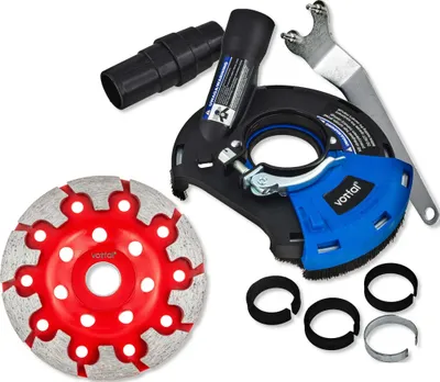 A collection of tools for a grinder, including a diamond grinding disc, a dust shroud, and adapters.