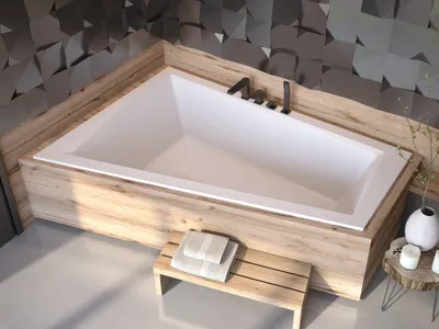 A modern bathroom with a built-in corner bathtub.