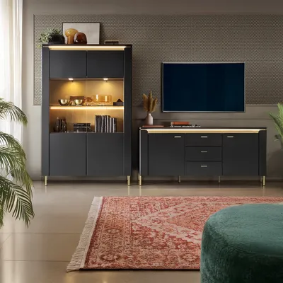 A modern living room with a display cabinet and a media console.