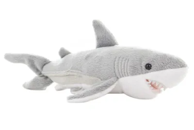 A plush toy shark is shown against a white background.
