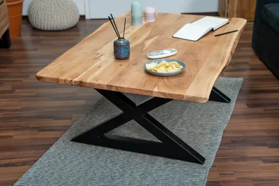 Produktbild von Couchtisch Baumkante 120 x 80 cm Akazie natur geschlossenes X-Gestell Quintus