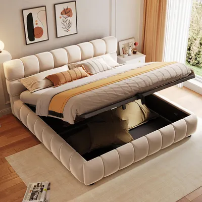 A bedroom scene with a bed that has storage underneath.