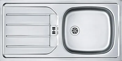 A top-down view of a stainless steel kitchen sink with a drainer and a basin.