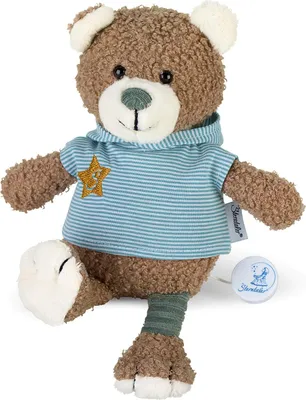 A brown teddy bear wearing a blue and white striped hoodie with a yellow star on it, sitting with one leg extended.