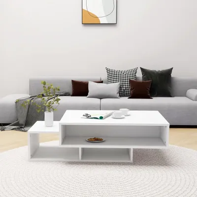 A modern living room scene with a couch and coffee table.