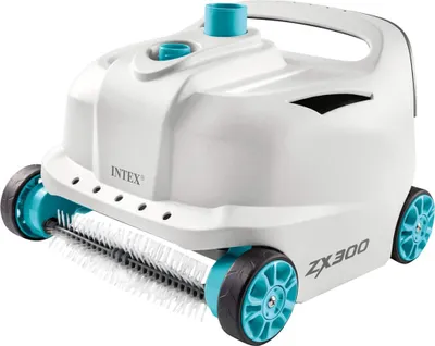 A white and teal automatic pool cleaner is shown against a white background.