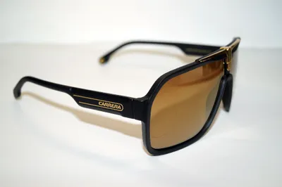 A pair of black Carrera sunglasses with brown lenses, shown from a side angle on a white background.