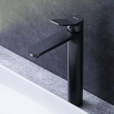 A black faucet is shown in a bathroom setting, positioned over a white sink.