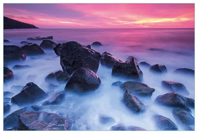 Produktbild von Wallario Küchenrückwand aus Glas, Größe: 90 x 60 cm, Motiv: Felsen im Meer bei Sonnenuntergang | Spritzschutz | abwischbar | pflegeleicht | in