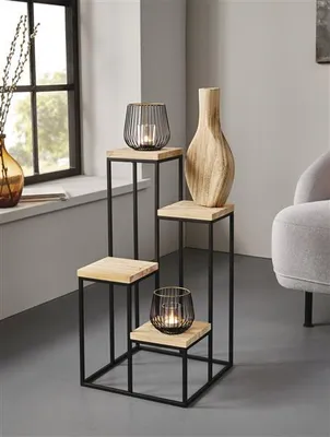 A multi-tiered shelf unit with decorative items on a light gray floor and white wall background.