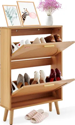 A wooden shoe cabinet with two flip-down drawers and a top shelf, displaying various shoes and decorative items.