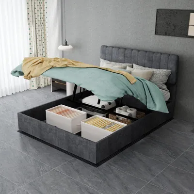 Productafbeelding van Boxspringbed 140x200 cm met grijze fluwelen bekleding, opbergruimte en gasveer, en een zacht beklede hoofdbord, ideaal voor de moderne slaapkamer
