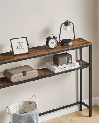 A console table with decorative items and storage.