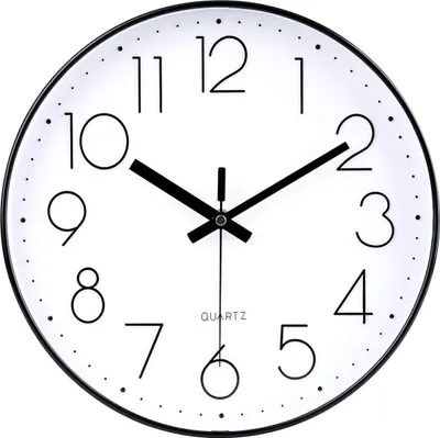 A close-up view of a black and white wall clock.