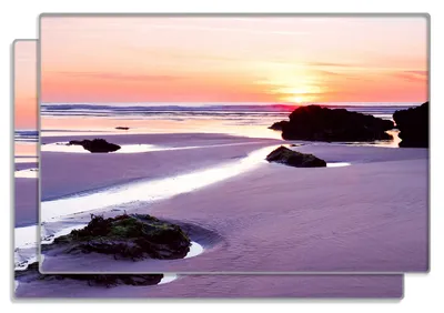 Produktbild von Wallario Frühstücksbrettchen 2er Set aus Glas, je 20 x 30 cm, mit rutschfesten Füßen, Motiv Sonnenuntergang am einsamen Strand