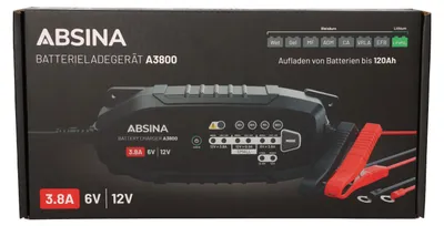 The image shows the retail packaging of a battery charger.