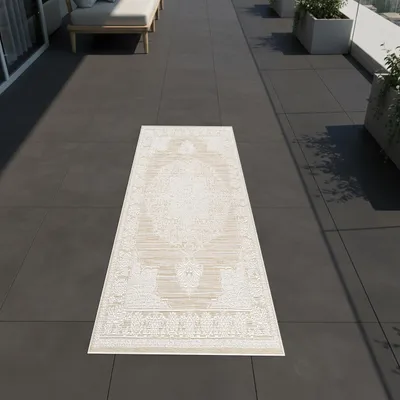 Imagen del producto de Alfombra beige crema con motivos ornamentales vintage, apta para interiores y exteriores. Tamaño: 60 x 90 cm